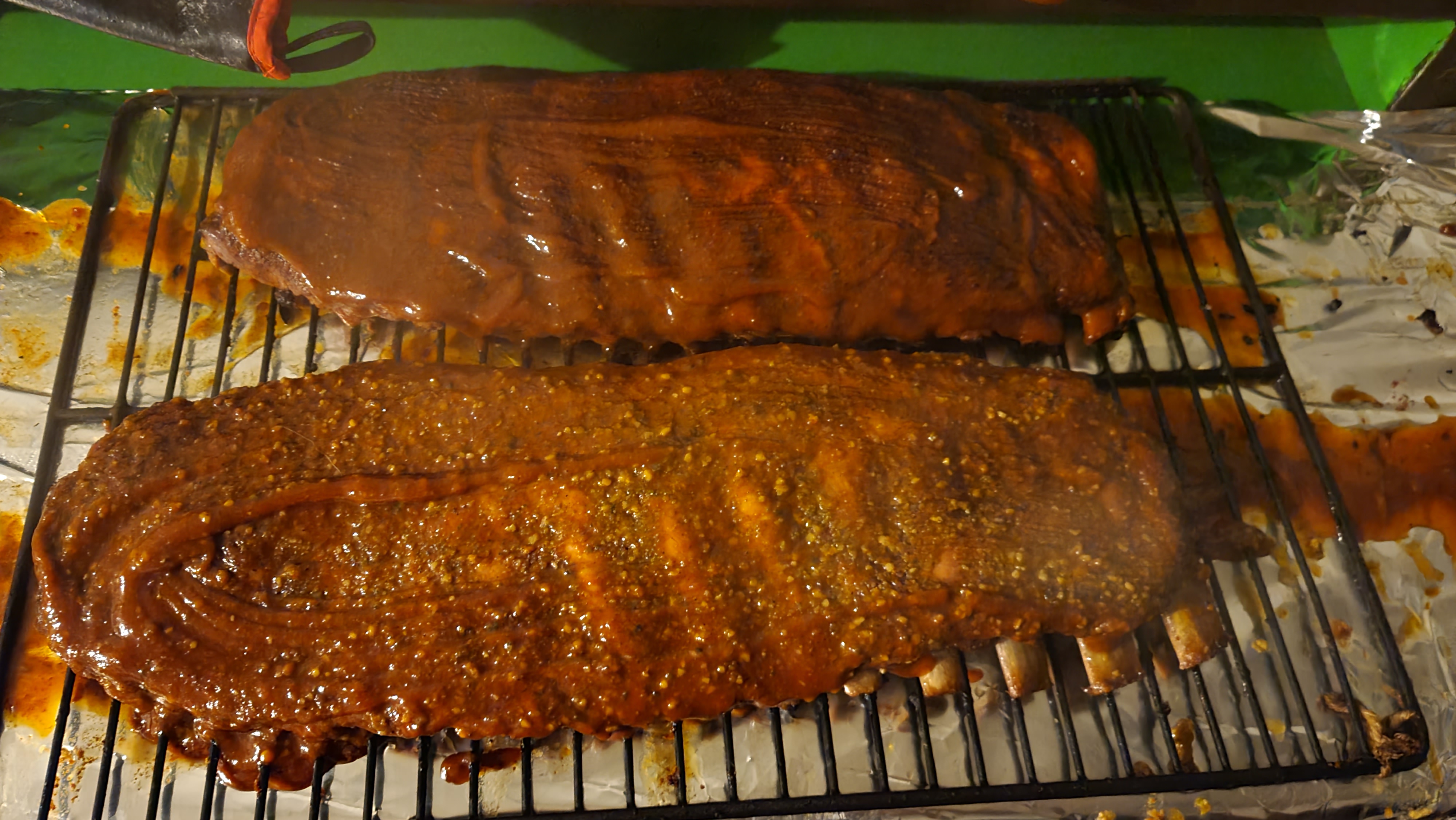 Two slabs of Apple Pie Ribs ready to go onto the smoker